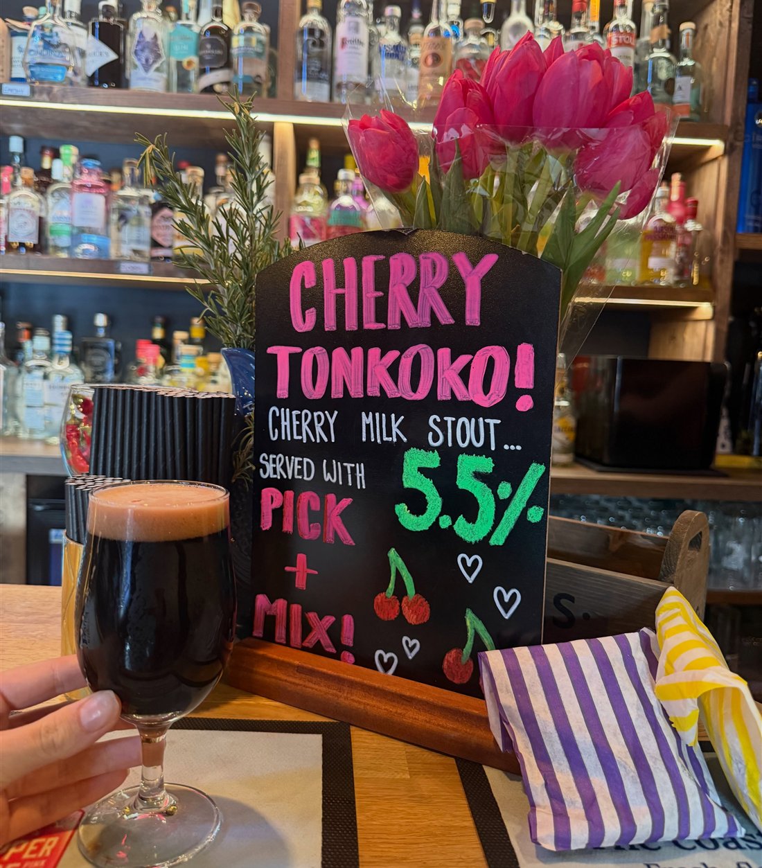 Cherry Tonkoko board with a glass of cherry milk stout